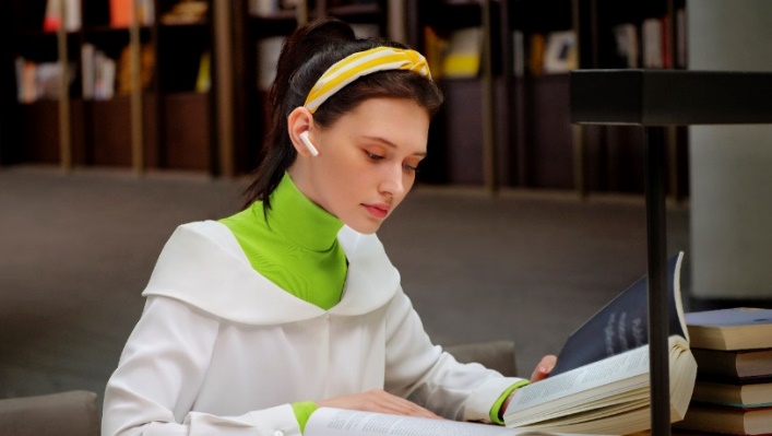 A young child reading a book

Description automatically generated with medium confidence
